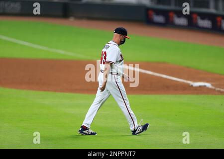 ATLANTA, GA - JULY 30: Atlanta Braves second baseman Orlando Arcia (11)  looks on tfrom the dugout during the Saturday evening MLB game between the  Atlanta Braves and the Arizona Diamondbacks on