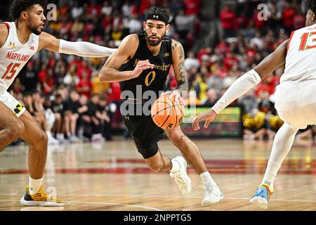 College Park, MD, USA. 26th Feb, 2023. Northwestern Wildcats guard Boo Buie (0) dribbles the ball during the NCAA basketball game between the Northwestern Wildcats and the Maryland Terrapins at Xfinity Center in College Park, MD. Reggie Hildred/CSM/Alamy Live News Stock Photo
