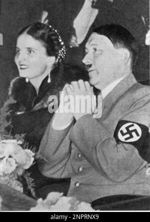 1939 , BERLIN , GERMANY : The italian ELEONORA PIETROMARCHI , married with italian diplomatic and politician fascist BERNARDO ATTOLICO ( 1880 - 1942 ) , Ambassador of Italy in Berlin from 1935 to 1940 . In this photo with ADOLF HITLER . - ritratto - portrait - POLITICA - POLITICO - ITALIA - GERMANIA - Berlino - POLITIC - portrait - ITALY - FASCISMO - FASCISM - FASCISTA - WWII - SECONDA GUERRA MONDIALE - 2nd World War - ITALIA - ANNI TRENTA - '30 - 30's - NAZISMO - svastica - svastika  ---- Archivio GBB Stock Photo