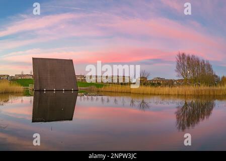 Pink sky reflections in Father Collins Park Stock Photo