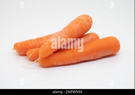 Raw carrots isolated on a white background Stock Photo