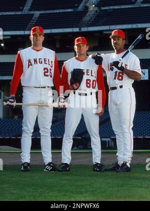 ANAHEIM, CA - FEBRUARY 02: Anaheim Angels third baseman Troy Glaus (25),  pitcher Scott Schoeneweis (60) and outfielder Garret Anderson (16) model  the upcoming 2002 season Angels home uniforms in February 2002