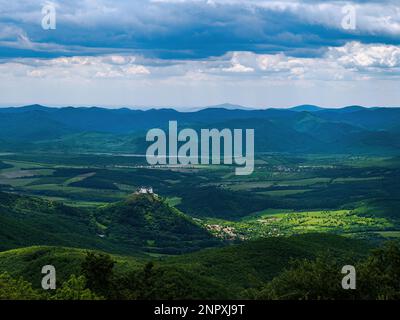 Medieval castle of Fuzer (Füzér), Hungary, in Zemplen mountains forest on a hilltop white rock fortress Stock Photo