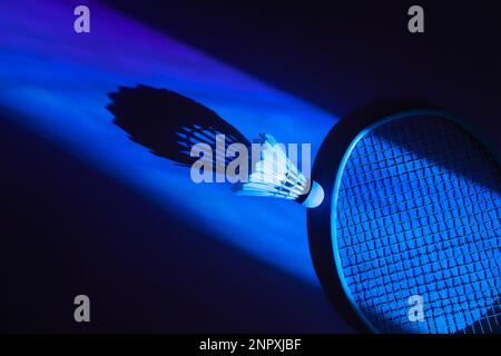 Badminton racket and shuttlecock on blue background. Horizontal sport theme poster, greeting cards, headers, website and app Stock Photo