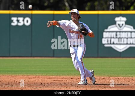 CORAL GABLES, FL - FEB 26: Miami outfielder Dario Gomez (22) runs to first  base after hitting a single in the third inning as the Miami Hurricanes  faced the Dartmouth Big Green