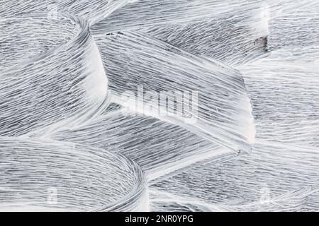 background texture of white paint strokes on a glass pane Stock Photo