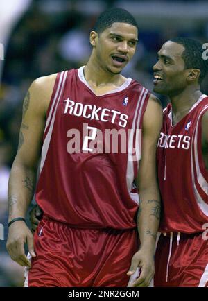 Maurice Taylor (left) and Steve Francis of the Houston Rockets celebrate during 99-87 victory over the Los Angeles Lakers in an NBA basketball game at the Staples Center, Thursday, Dec. 25, 2003, in Los Angeles. (Kirby Lee via AP)