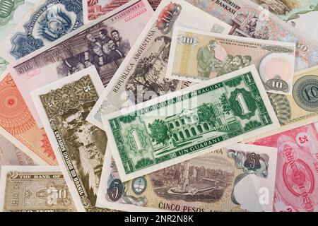 Old assorted foreign paper currency banknotes. Stock Photo
