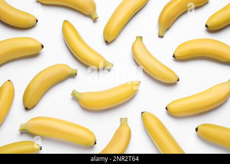 Sweet ripe baby bananas on white background, top view Stock Photo