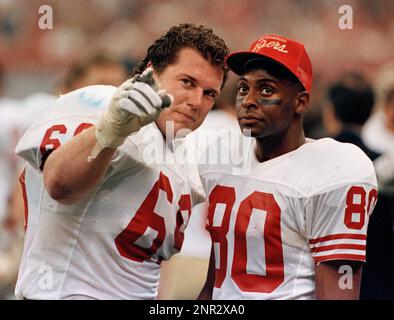 San Francisco 49ers guard Bruce Collie (L) and wide receiver Jerry Rice  during Super Bowl XXIV in New Orleans, Louisiana, January 28, 1990. The  49ers beat the Denver Broncos 55–10. (AP Photo/NewsBase