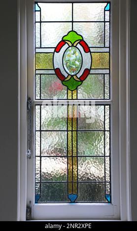 Beautiful panes of leaded glass in the front door of a Federation style home, Australia. Stock Photo