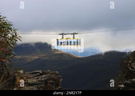 Katoomba, NSW, Australia - 4 Sept 2022 - Cable car suspended above the Blue Mountains National Park near the Three Sisters rock formation. Stock Photo