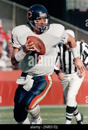 San Francisco, California, USA. 23rd Dec, 1991. San Francisco 49ers vs. Chicago  Bears at Candlestick Park Monday, December 23, 1991. 49ers beat Bears  52-14. Bears quarterback Jim Harbaugh (4) passes ball under pressure from  49er defensive end