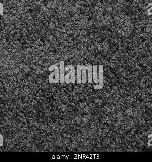 gray shaggy deep-pile carpet background texture Stock Photo