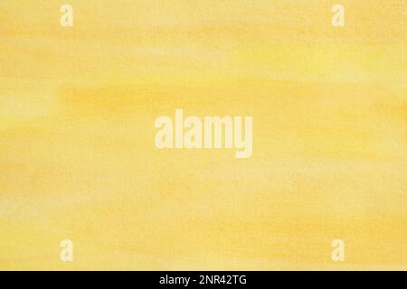 abstract yellow watercolor background with brush stroke texture on paper Stock Photo
