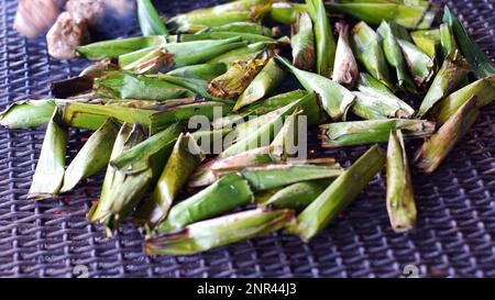 Typical Food From The City Of Muntok - Indonesia (Otak-otak), With Fish Dough Wrapped In Banana Leaves And Then Grilled, In The City Of Muntok Stock Photo