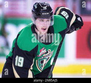 Prince Albert Raiders player Ozzy Wiesblatt, lt, collides with Calgary  Hitmen (wearing Calgary Wranglers retro jerseys) player Sean Tschigeri  during WHL (Western Hockey League) hockey action in Calgary, Alta., on  Friday, Feb.