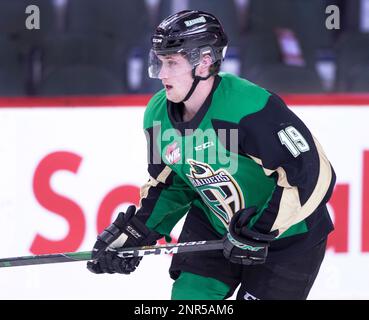 Prince Albert Raiders player Ozzy Wiesblatt, lt, collides with Calgary  Hitmen (wearing Calgary Wranglers retro jerseys) player Sean Tschigeri  during WHL (Western Hockey League) hockey action in Calgary, Alta., on  Friday, Feb.