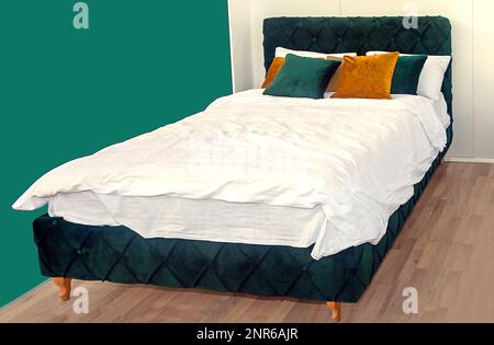 Modern made up bed with white sheets and decorative colorful pillows inside bedroom interior Stock Photo