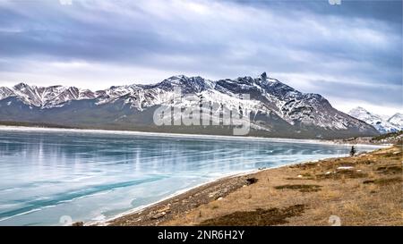 Frozen Abraham lake with clear ice landscape in winter season cloudy day , Alberta, Canada Stock Photo