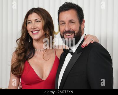 Los Angeles, USA. 26th Feb, 2023. Jackie Sandler and Adam Sandler arrive at the 29th Annual Screen Actors Guild Awards held at the Fairmont Century Plaza in Los Angeles, CA on Sunday, ?February 26, 2023. (Photo By Sthanlee B. Mirador/Sipa USA) Credit: Sipa USA/Alamy Live News Stock Photo