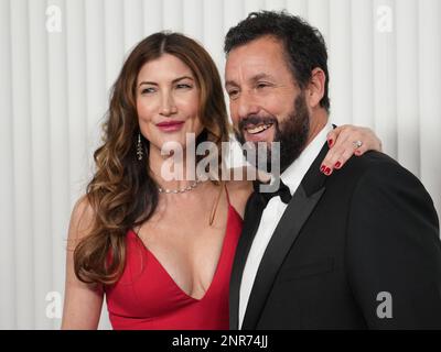 Los Angeles, USA. 26th Feb, 2023. Jackie Sandler and Adam Sandler arrive at the 29th Annual Screen Actors Guild Awards held at the Fairmont Century Plaza in Los Angeles, CA on Sunday, ?February 26, 2023. (Photo By Sthanlee B. Mirador/Sipa USA) Credit: Sipa USA/Alamy Live News Stock Photo