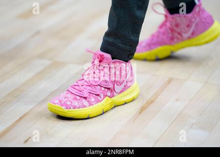 The shoes of Memphis Grizzlies guard Ja Morant are shown as he plays  against the Dallas Mavericks in an NBA basketball game in Dallas, Sunday,  Jan. 23, 2022. (AP Photo/Tony Gutierrez Stock