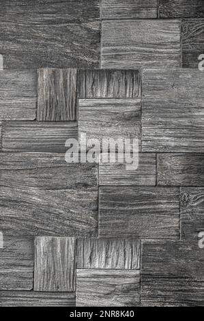 stone block wall texture. Stone Wall, Grey Bricks Background. Faded dark black rock stone wall texture background. Modern stone wall decoration Stock Photo