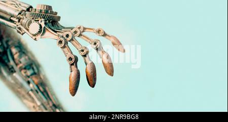 Closeup of an old rusty robot arm on a blue background, panoramic banner with copy space. Stock Photo