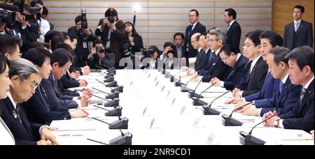 Japan's Prime Minister Shinzo Abe attends a meeting of New Coronavirus Infectious Disease Headquarters (task force) at the prime minister's office in Tokyo on February 13, 2020. The number of the patients who have been infected with a new coronavirus COVID-19 has reached to 48,206 and the death toll has been confirmed 1,310 so far as of February 13th in China. As the outbreak continues to spread outside China, the World Health Organization (WHO) declared the new coronavirus a Global Health Emergency on Jan 31st. ( The Yomiuri Shimbun via AP Images )