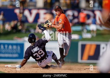 Lakeland FL USA; Baltimore Orioles catcher James McCann (27) puts the ball  into play during an MLB spring training game against the Detroit Tigers at  Stock Photo - Alamy