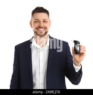 Man with modern breathalyzer on white background Stock Photo