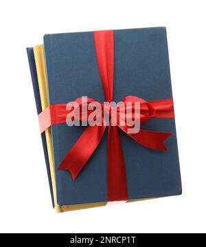 Different books tied with red ribbon isolated on white Stock Photo - Alamy