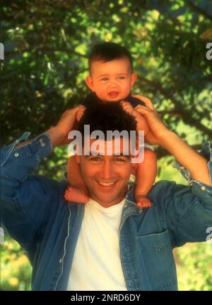 Los Angeles, California, USA 1st July 1996 (EXCLUSIVE) Actor Kyle Candler and daughter Sydney Chandler pose at an exclusive photo shoot on July 1, 1996 in Los Angeles, California, USA. Photo by Barry King/Alamy Stock Photo Stock Photo