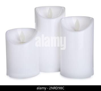 Decorative flameless LED candles on white background Stock Photo