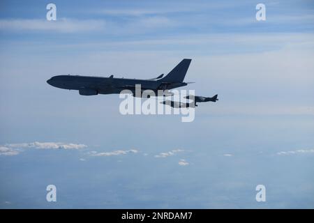 230222-N-NO777-1002 SLOVAKIA (Feb. 22, 2023) A Royal Air Force A330 tanker refuels two Spanish Navy AV-8B Harriers during combined long range strike training, Feb. 22, 2023. The George H.W. Bush Carrier Strike Group is on a scheduled deployment in the U.S. Naval Forces Europe area of operations, employed by U.S. Sixth Fleet to defend U.S., allied, and partner interests. (U.S. Navy courtesy photo) Stock Photo
