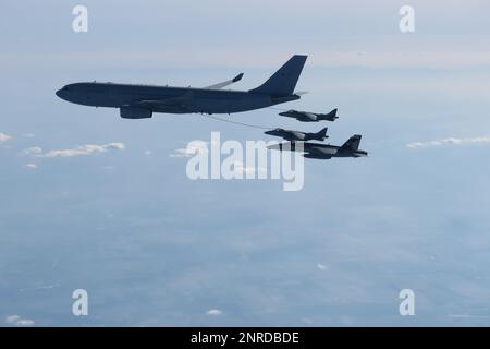230222-N-NO777-1003 SLOVAKIA (Feb. 22, 2023) A Royal Air Force A330 tanker refuels two Spanish Navy AV-8B Harriers during combined long range strike training, Feb. 22, 2023. The George H.W. Bush Carrier Strike Group is on a scheduled deployment in the U.S. Naval Forces Europe area of operations, employed by U.S. Sixth Fleet to defend U.S., allied, and partner interests. (U.S. Navy courtesy photo) Stock Photo