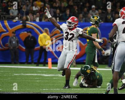NEW ORLEANS, LA - JANUARY 01: Georgia Bulldogs Linebacker Monty Rice (32) celebrates during the Allstate Sugar Bowl between the Georgia Bulldogs and Baylor Bears on January 01, 2020, at Mercedes-Benz Superdome in New Orleans, LA.(Photo by Jeffrey Vest/Icon Sportswire) (Icon Sportswire via AP Images)