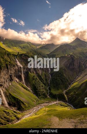 several large waterfalls falling down a steep cliff Stock Photo - Alamy
