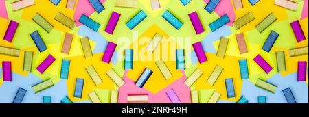 Multicolored office metal staples for stapler on multicolored paper Sticky Notes Stock Photo