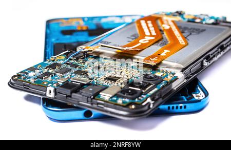 main case and back cover of disassembled blue smartphone isolated on white background close up Stock Photo