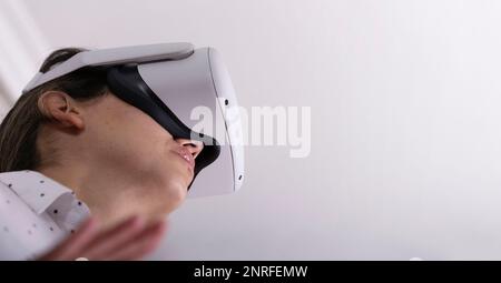 Woman with virtual reality glasses. Stock Photo