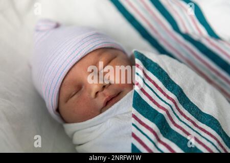 Close up of sleeping newborn baby in hospital Stock Photo