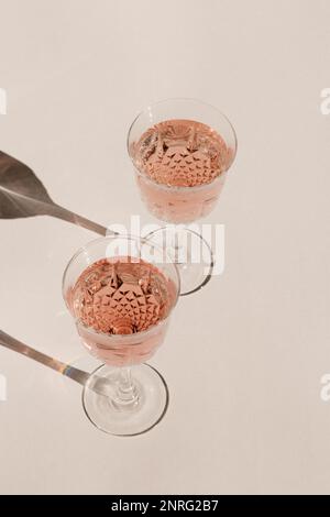 Two wine glasses filled with rosé Stock Photo