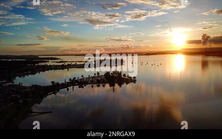 Colourful Belmont Bay against sky during sunset Stock Photo