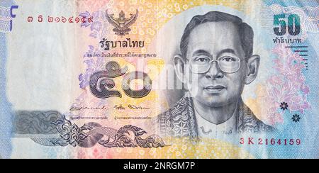 Macro detail picture with 50 thai baht banknote. Baht is the official currency in Thainland. Stock Photo