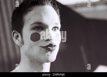 Umea, Norrland Sweden - April 14, 1997: young man turns into crazy clown Stock Photo