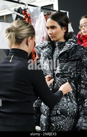 The backstage of Budapest Select at Milan Fashion Week 2023 is a frenetic and energetic place, where designers, models, make-up artists Stock Photo