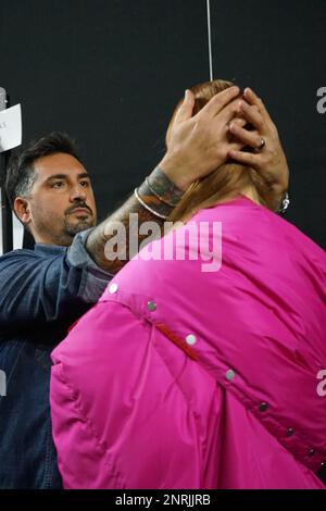 The backstage of Budapest Select at Milan Fashion Week 2023 is a frenetic and energetic place, where designers, models, make-up artists Stock Photo