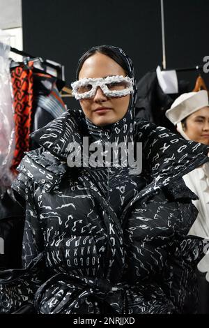 The backstage of Budapest Select at Milan Fashion Week 2023 is a frenetic and energetic place, where designers, models, make-up artists Stock Photo